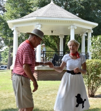 Harold and Peggy Berg dance to the music of Flipside coming from the Patton Park gazebo in the background.